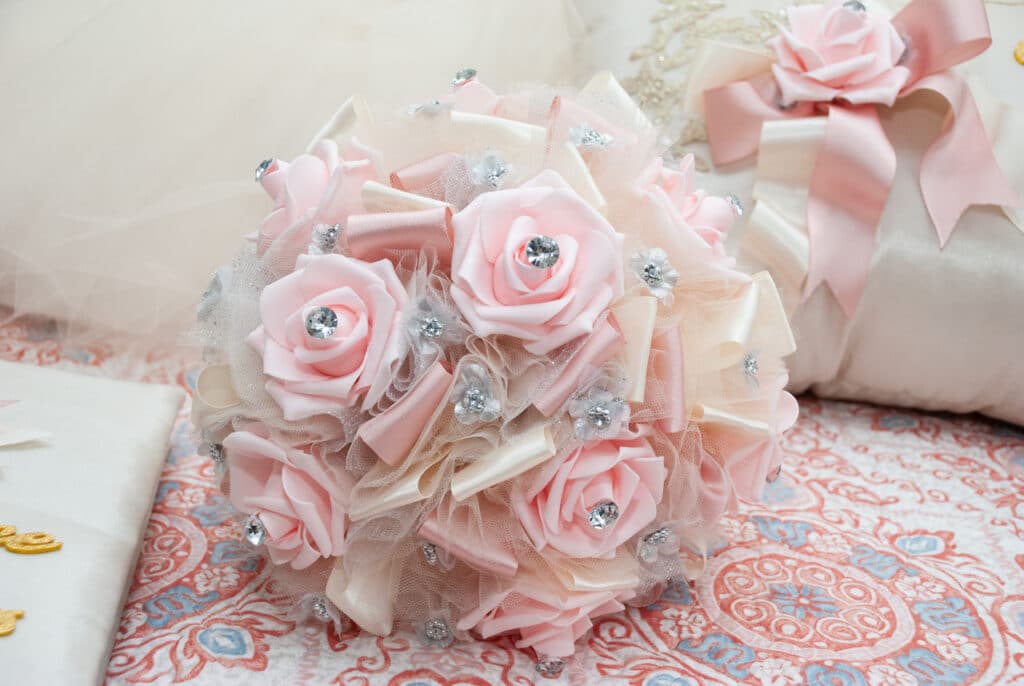 pink roses quince bouquet with diamonds