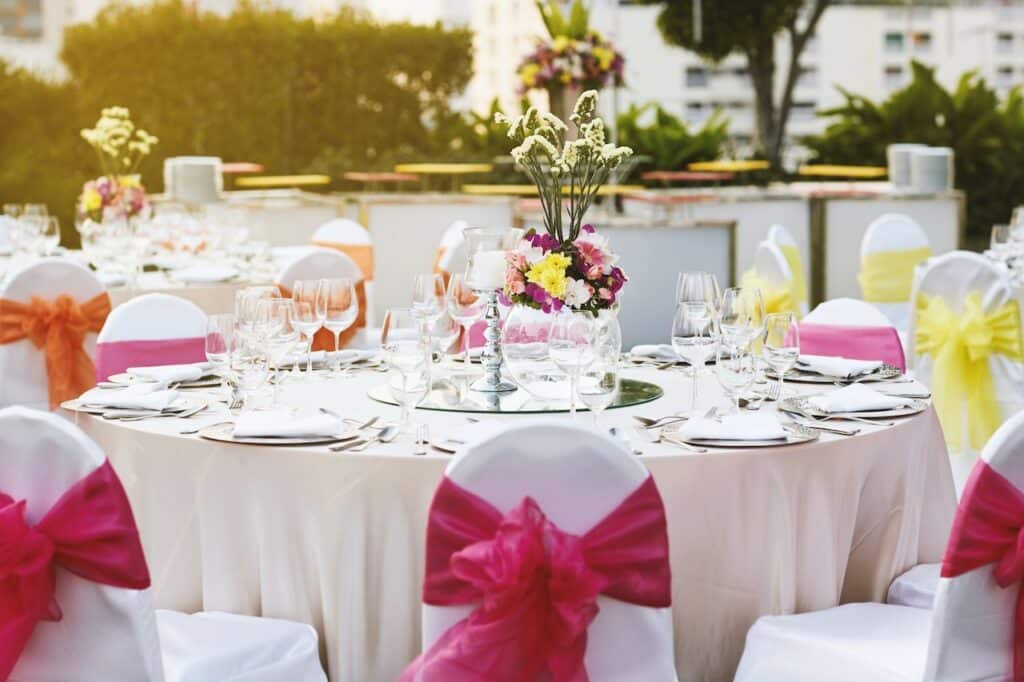 tables decorated for spring quinceanera