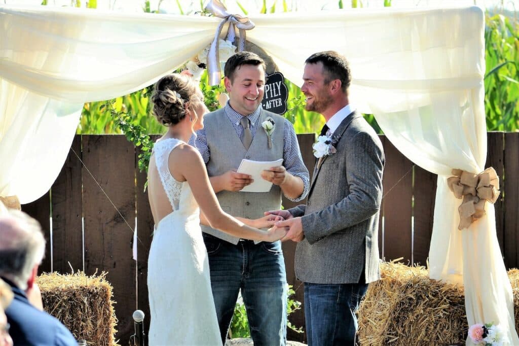 wedding officiant marrying bride and groom