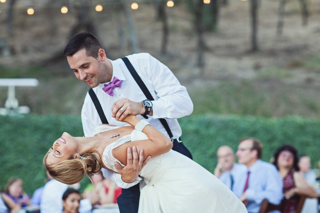 groom dancing with bride