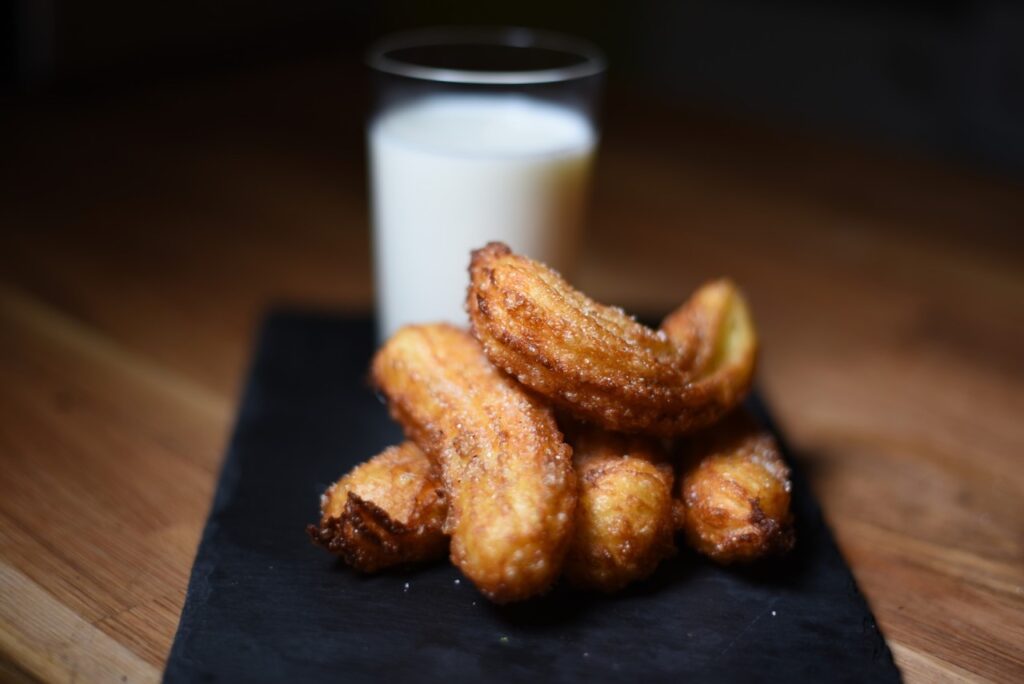 churros and milk snack at a wedding