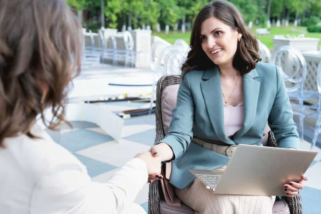 Woman talking to a wedding planner.