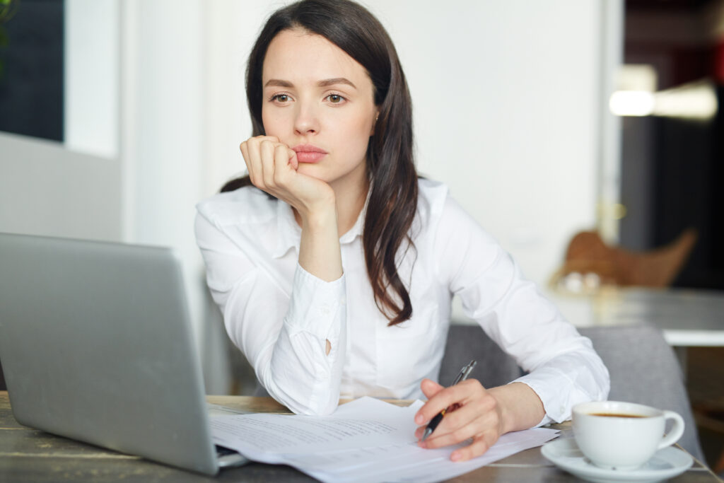 young woman contemplating a decision