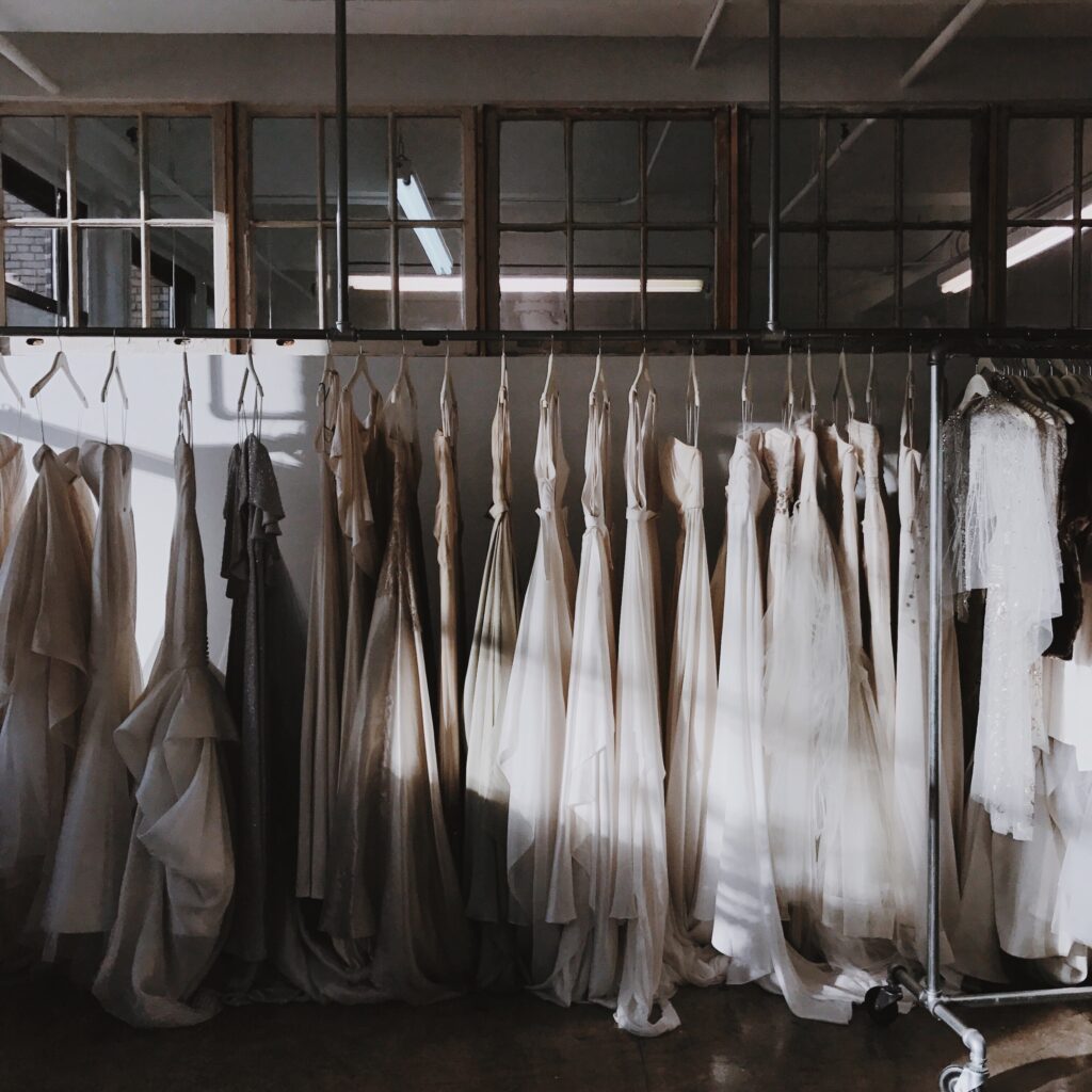 rack of wedding dresses hanging