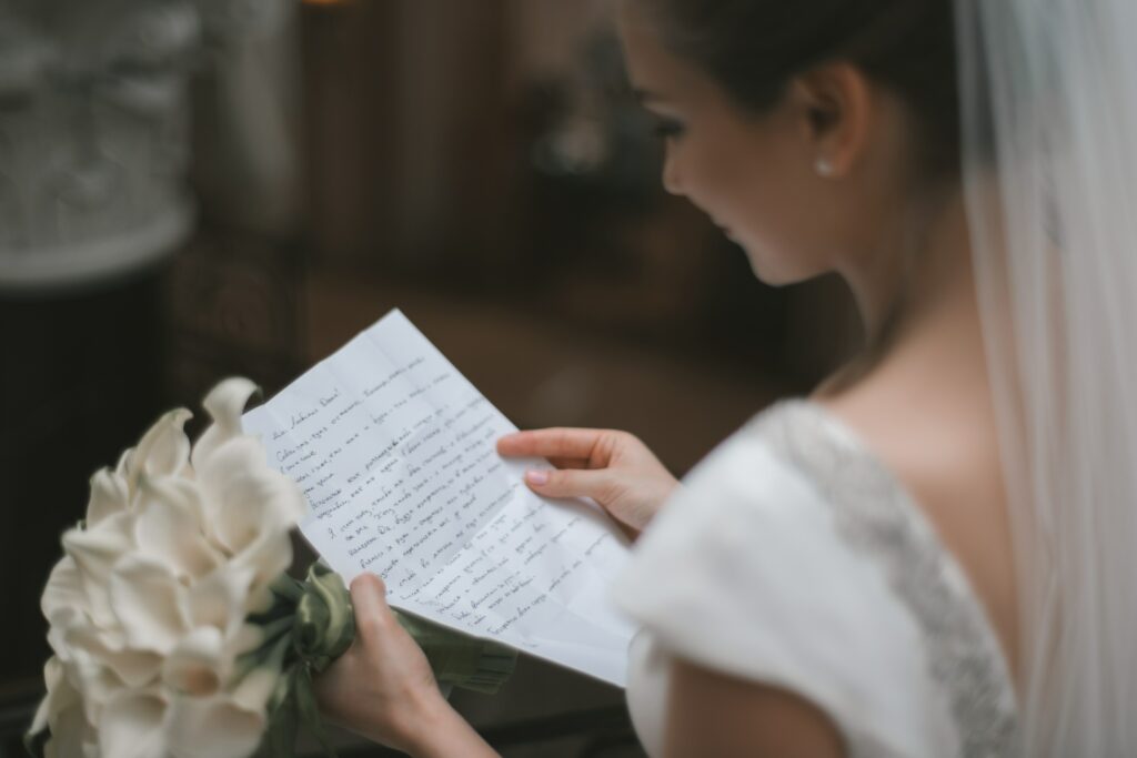 bride rereading her wedding vows
