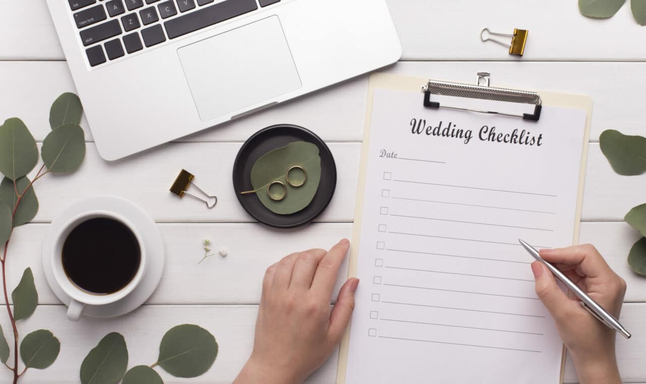 woman working on simple wedding checklist