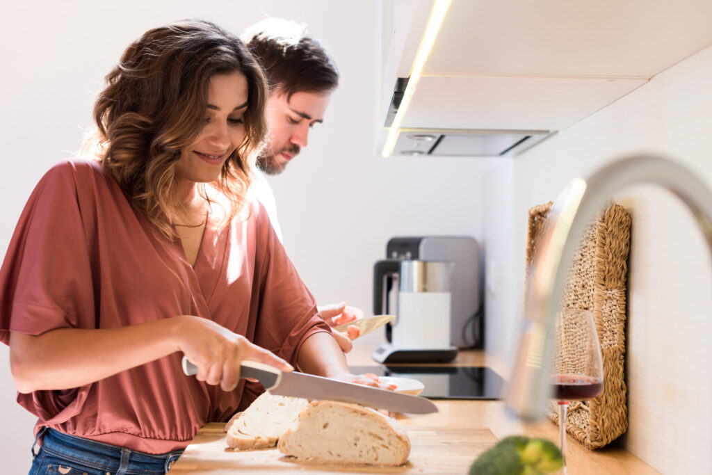 Couple cooking together at home