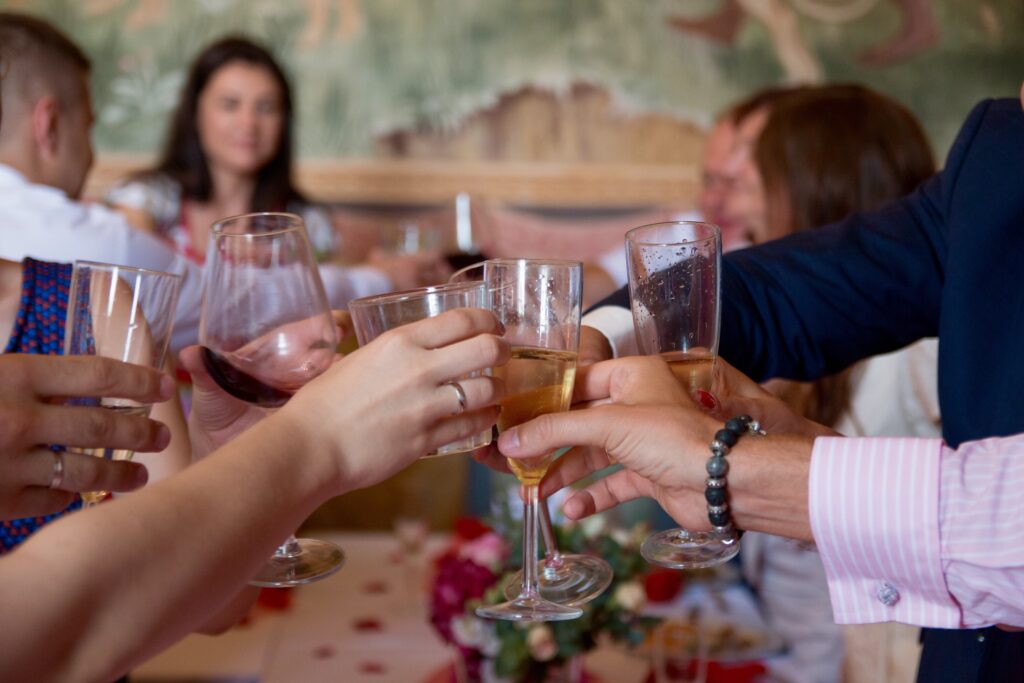 wedding guests celebrating with champagne