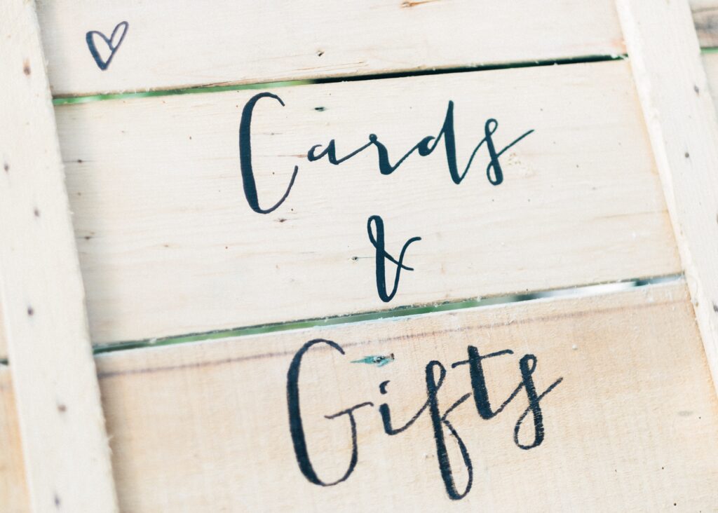 cards and gifts sign at a wedding