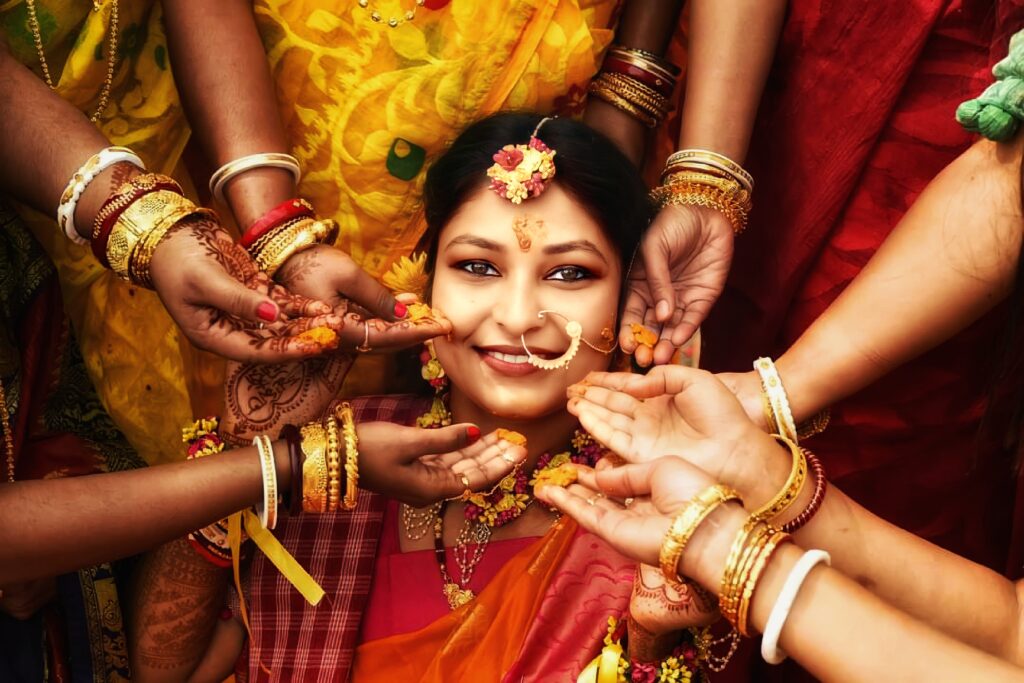 bride poses at traditional Indian wedding
