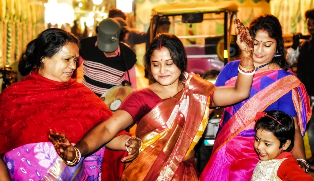 guests dance at traditional Indian wedding