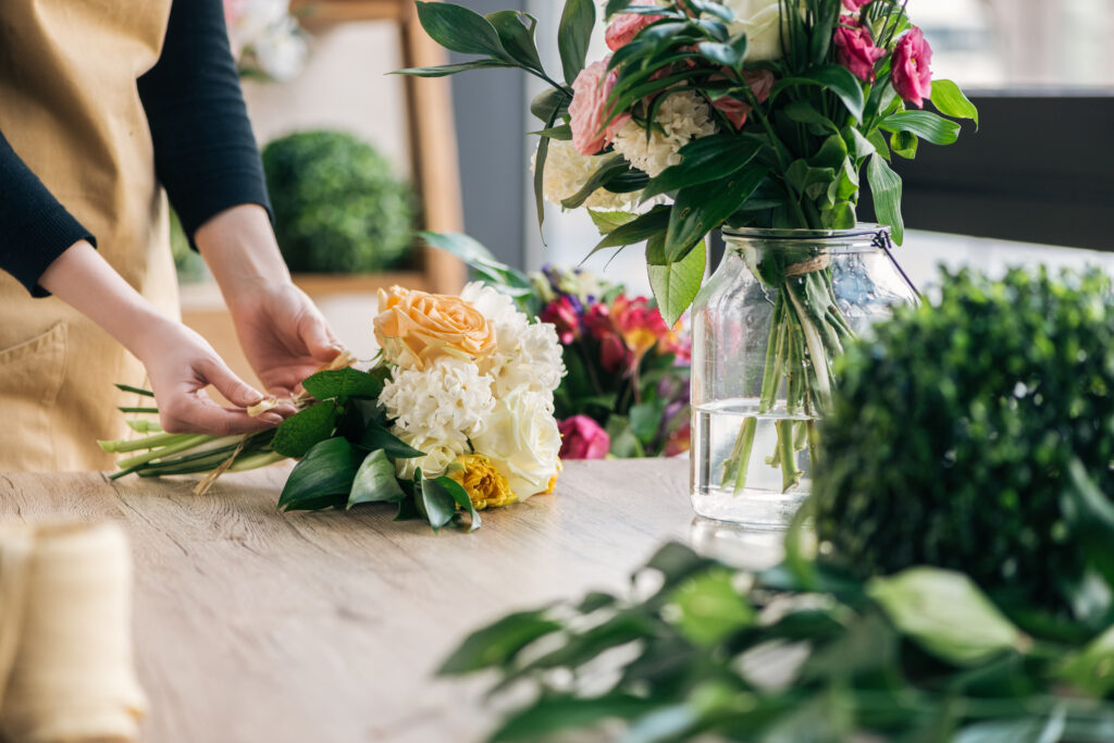 florist making wedding bouquets