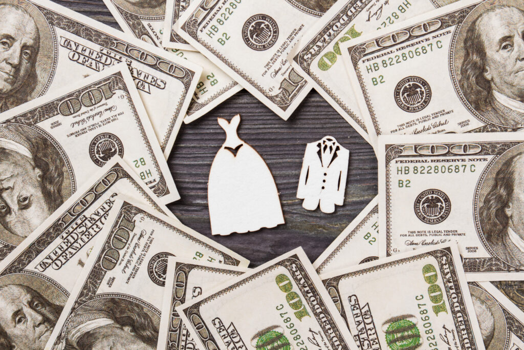 Cash frames wooden miniature wedding dress and suit