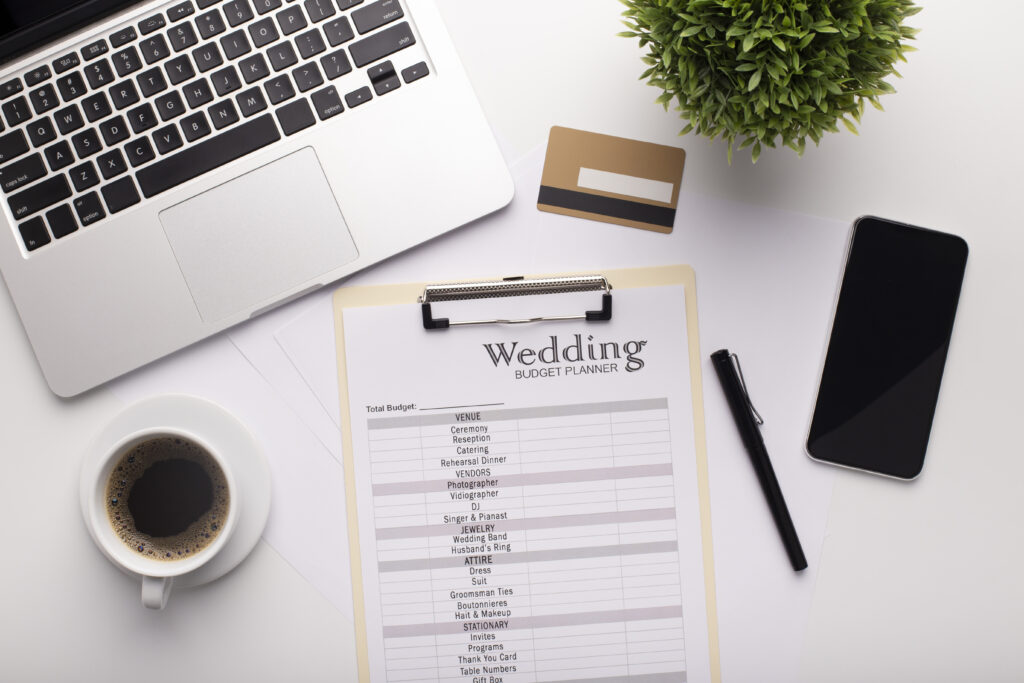 wedding budget planner page on clipboard