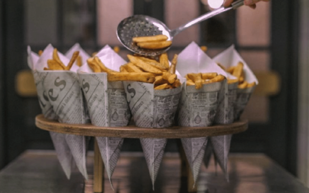 newspaper cones filled with fries