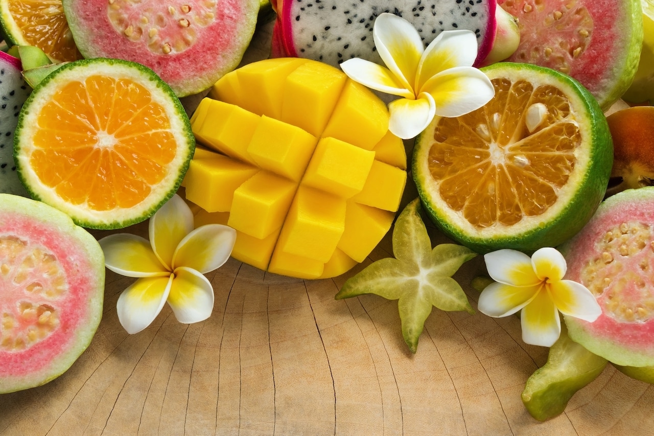 bright colorful tropical fruit and flowers