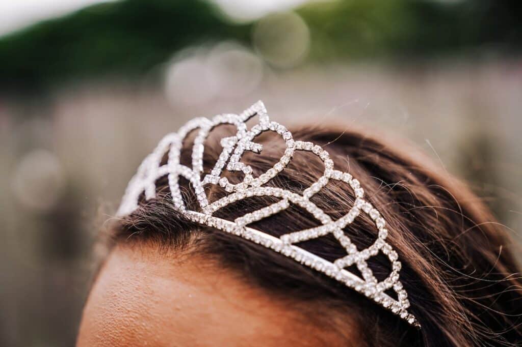 quinceañera wearing crown with 15