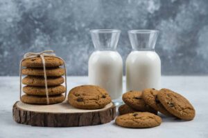 jars of milk with delicious cookies