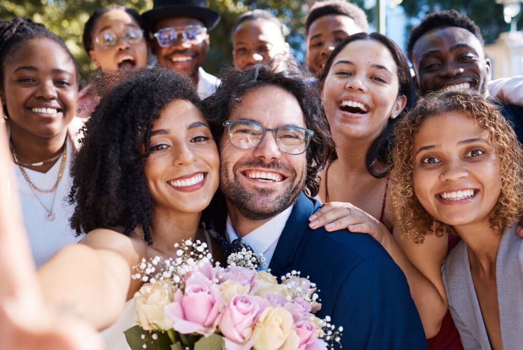 wedding selfie of happy friends and family