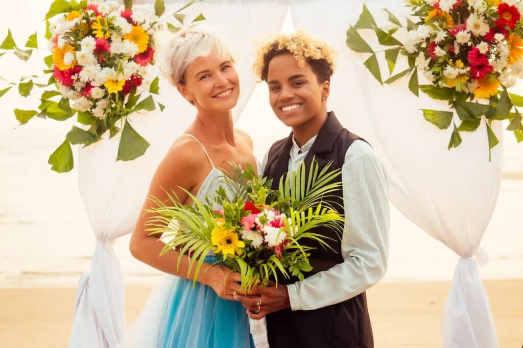 married couple at beach wedding