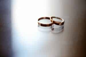 closeup of bride and groom wedding rings