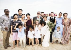 bride and groom surrounded by extended family members