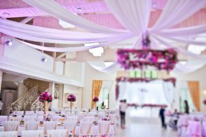 ballroom with decorations and tables set for celebration