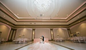 young woman posing for quinceanera at marinaj ballroom