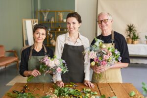 florists working together in floral shop