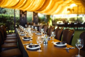 table with table settings and decorations for banquet