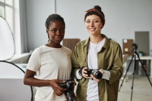 two professional photographers in their studio