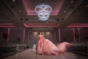 young woman in quinceanera dress at Marinaj