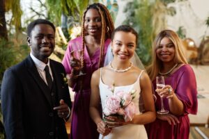 bride and groom with family at wedding reception