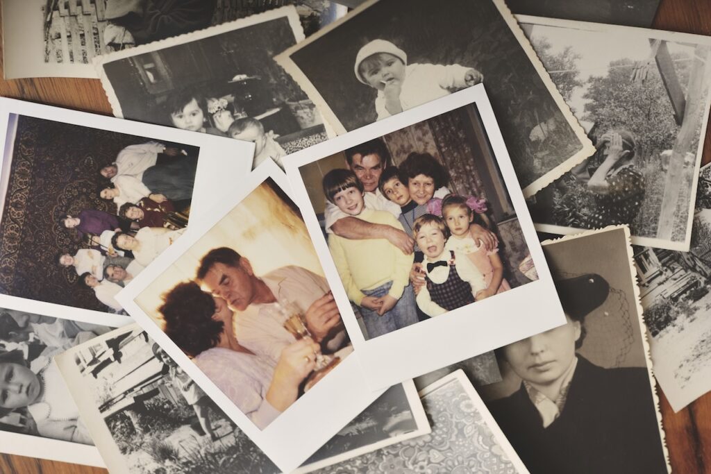 family photographs on table for memorial