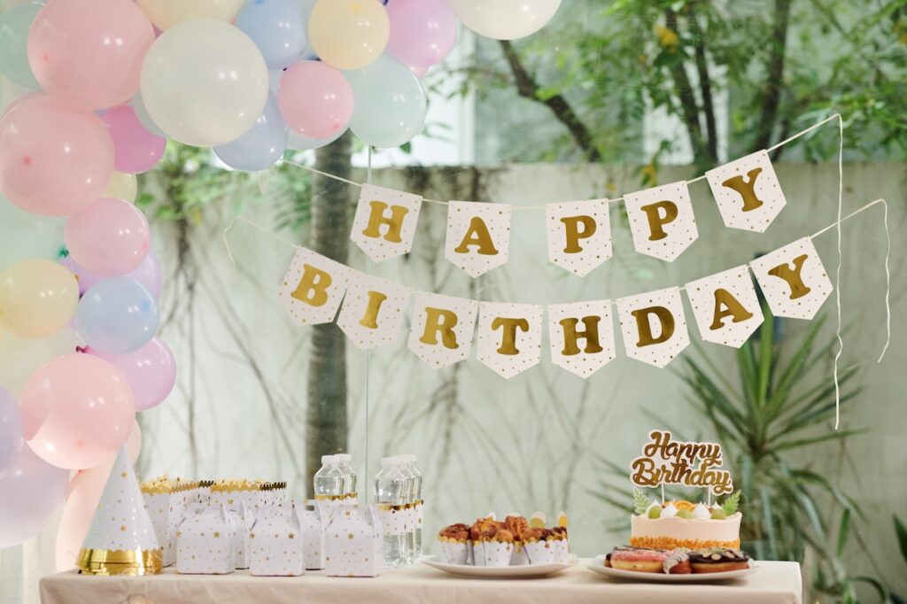 Birthday Party Arrangement with sign and desserts