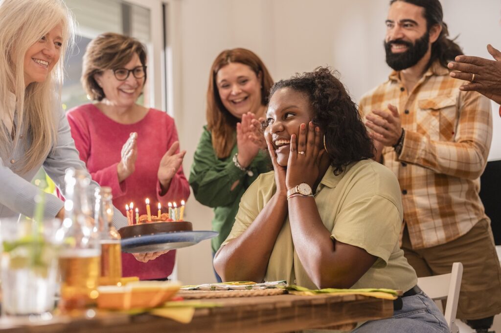 group of friend celebrating a surprise birthday party