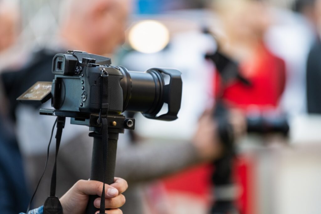 A professional photographer documenting event