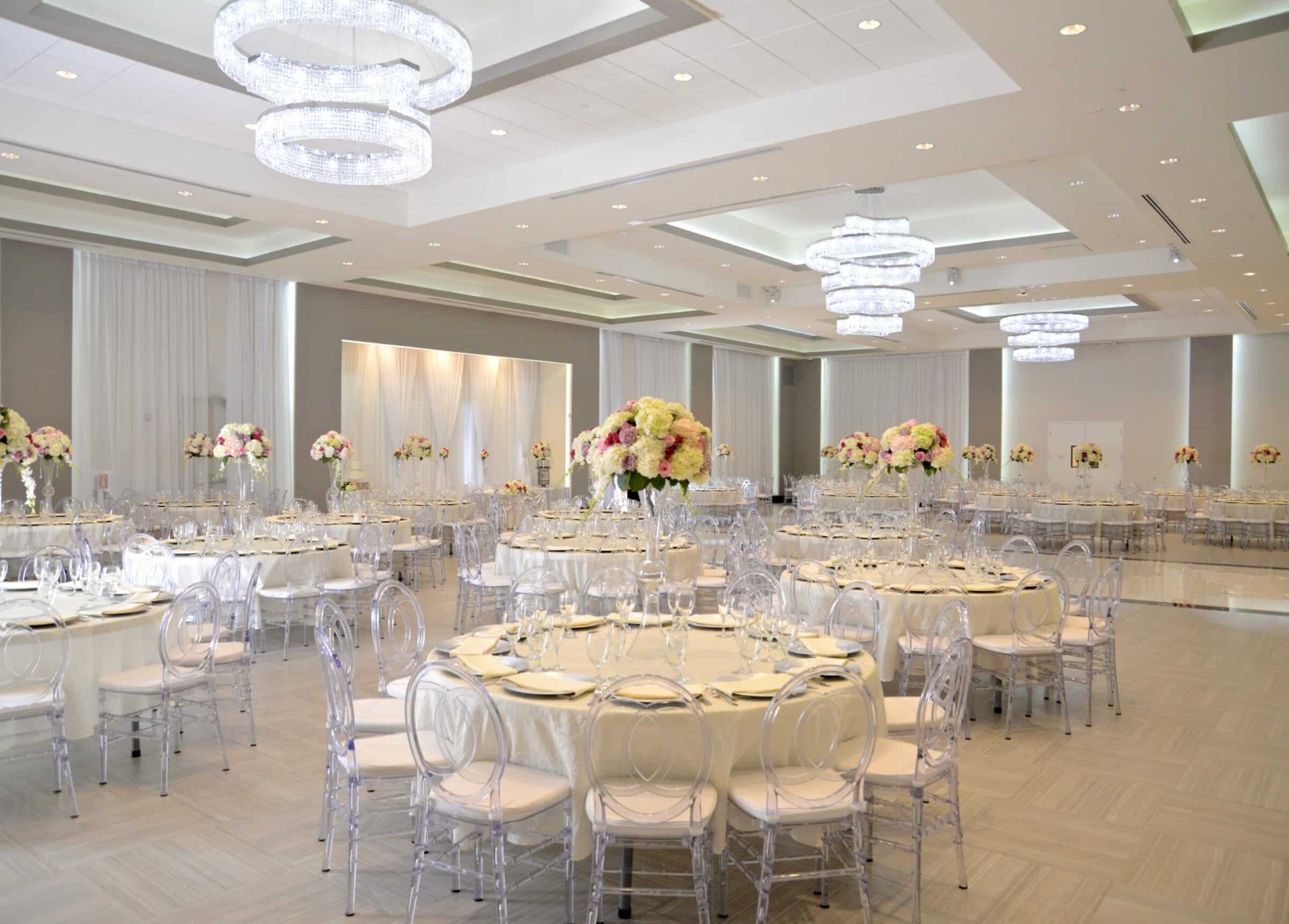 marinaj ballroom with white lighting and decor